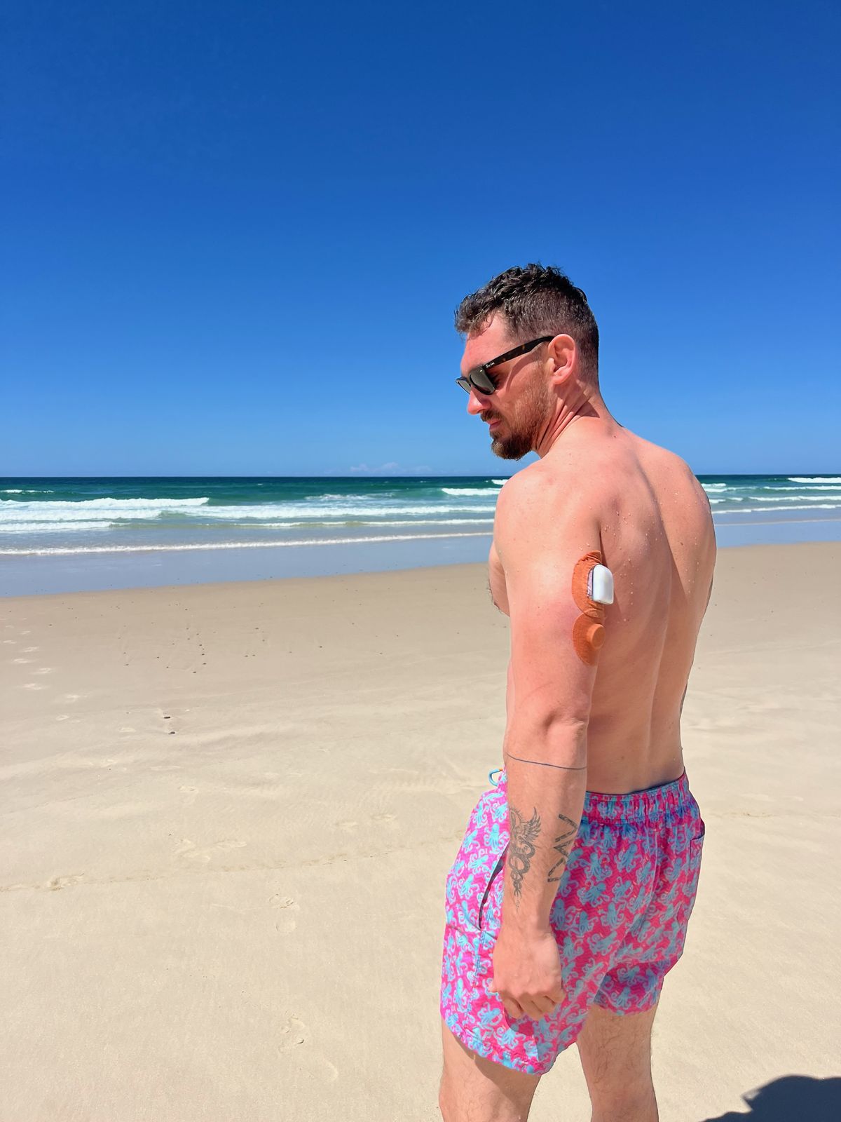 Tyler on the beach with CGM